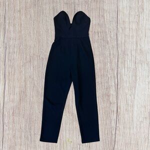 Women’s black sleeves jumpsuit with sweetheart bust size XS.